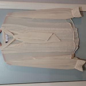 JENNIFER LOPEZ beige sheer blouse.